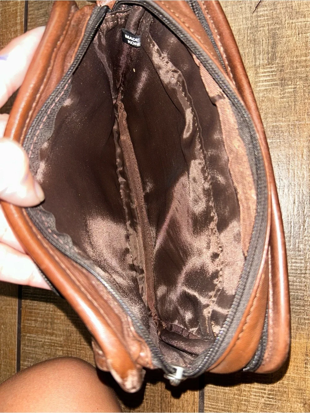 TUMI brown leather travel bag